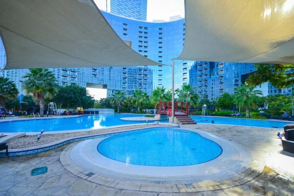 Cozy 1Br In Iconic Tower Apartment Абу Даби Екстериор снимка