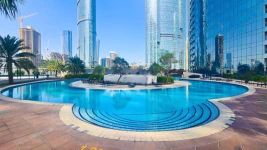 Cozy 1Br In Iconic Tower Apartment Абу Даби Екстериор снимка
